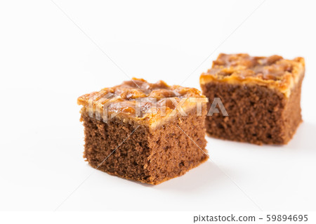 walnut toffee cake with copy on white background. walnut toffee cake with copy on white background. 59894695