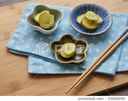 Cucumber pickles and chopsticks 59896890