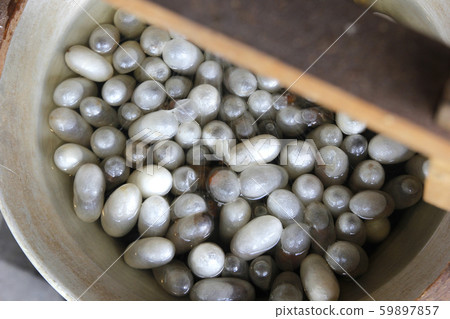 white silkworm cocoons in pot, The process of white silkworm cocoons in pot, The process of 59897857