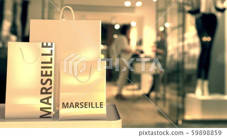 Paper bags with Marseille text. Shopping in France related 3D rendering Paper bags with Marseille text. Shopping in France related 3D rendering 59898859