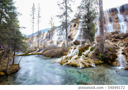 Beautiful waterfall view in Jiuzhaigou in Jiuzhai Valley National Park,Autumn season Beautiful waterfall view in Jiuzhaigou in Jiuzhai Valley National Park,Autumn season 59899172