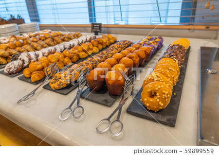 Beautifully buffet counter with assortment of delicious pastry croissants Beautifully buffet counter with assortment of delicious pastry croissants 59899559