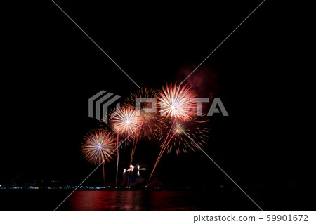 Fireworks light up the sky with dazzling display Fireworks light up the sky with dazzling display 59901672