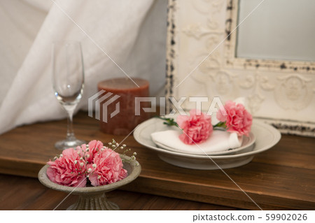 Carnations and dishes 59902026