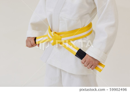 Judoist with yellow belt Judoist with yellow belt 59902496