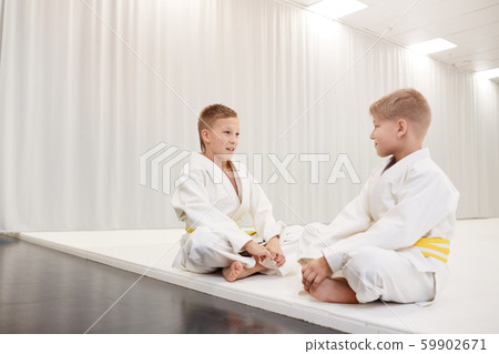 Two boys resting after sport training 59902671
