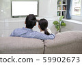 Back view of young family, man and woman watching 59902673