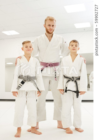 Coach and young judoists 59902727