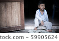 poor asian boy  sad alone ,vintage tone 59905624