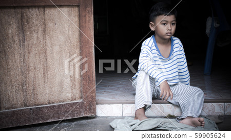 poor asian boy sad alone ,vintage tone poor asian boy sad alone ,vintage tone 59905624