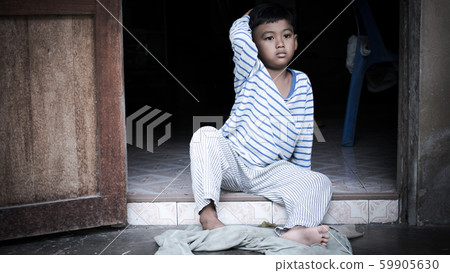 poor asian boy sad alone ,vintage tone poor asian boy sad alone ,vintage tone 59905630