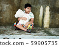 Asian boy sitting alone ,vintage tone 59905735