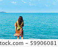 Young, beautiful woman at the sea 59906081