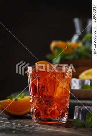 Traditional italian cocktail with wine and orange Traditional italian cocktail with wine and orange 59906087