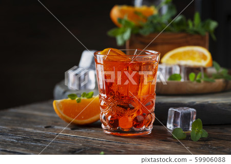 Traditional italian cocktail with wine and orange Traditional italian cocktail with wine and orange 59906088