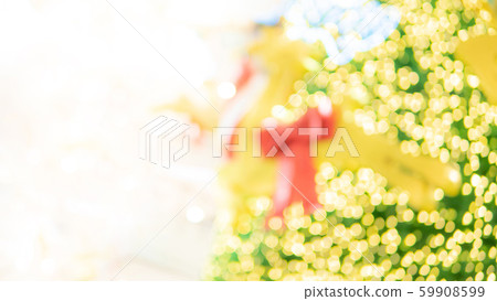 Blurred illuminated Christmas lights background Blurred illuminated Christmas lights background 59908599