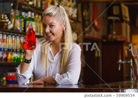 Woman working at the bar counter Woman working at the bar counter 59909554