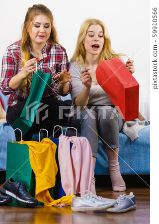 Two happy female friends after shopping Two happy female friends after shopping 59910566