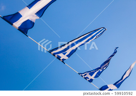 Greek flags waving outdoor 59910592