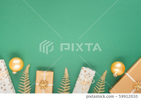Green christmas background with gift boxes Green christmas background with gift boxes 59912010