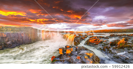 Dramatic sunset view of fantastic waterfall and Dramatic sunset view of fantastic waterfall and 59912426