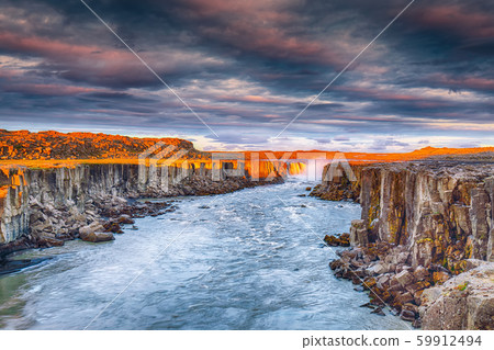 Dramatic sunset view of fantastic waterfall and Dramatic sunset view of fantastic waterfall and 59912494