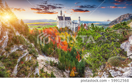 Majestic sunset view of famous Neuschwanstein Majestic sunset view of famous Neuschwanstein 59912568