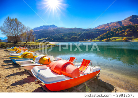 Bright autumn view of San Valentino village and 59912573