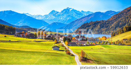 Magnificent autumn view of St.Valentin village and 59912633