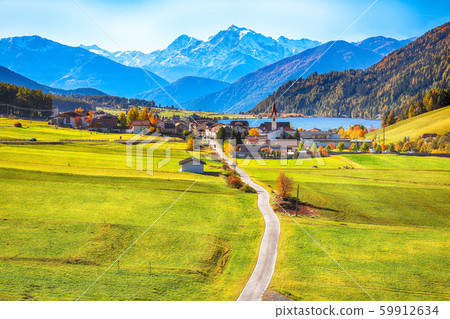 Magnificent autumn view of St.Valentin village and 59912634