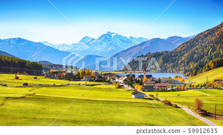 Magnificent autumn view of St.Valentin village and 59912635