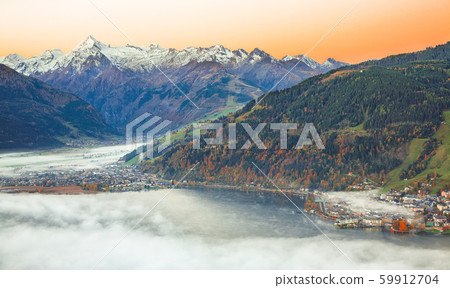Spectacular autumn view of lake meadows trees and 59912704