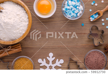 ingredients and kitchen tools for dessert baking on wooden background 59912730
