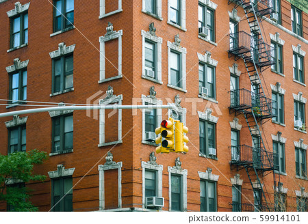 Building facade and traffic light in New York City Building facade and traffic light in New York City 59914101