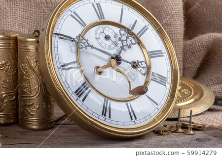 Repair of vintage wall clock, concept of memory and past time 59914279