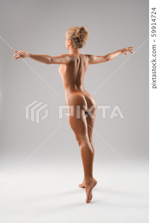 Nude beautiful woman jumping rearview Nude beautiful woman jumping rearview 59914724