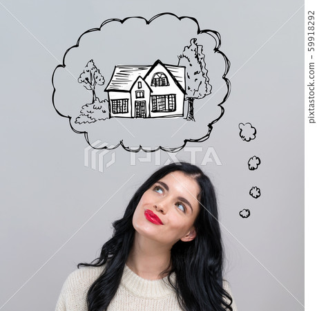 Dreaming of new home with happy young woman Dreaming of new home with happy young woman 59918292