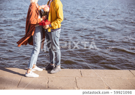 Couple spending their date near the water 59921098