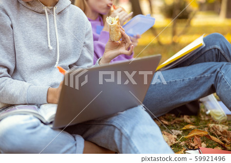 Close up of hungry girls that having lunch Close up of hungry girls that having lunch 59921496