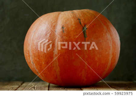 big orange pumpkin on boards 59923975