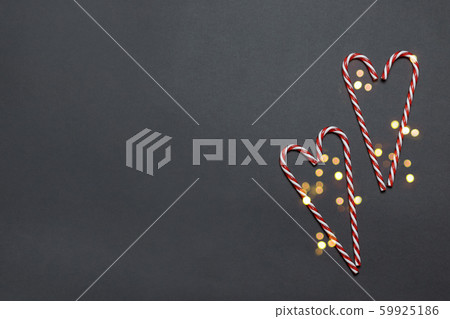 Happy holidays greeting card with candy cane in a 59925186