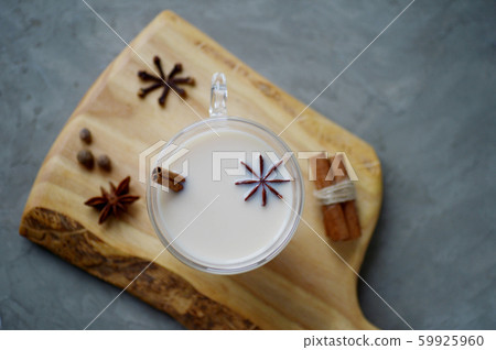 Indian masala chai tea, spiced tea with milk on 59925960