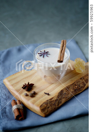 Indian masala chai tea, spiced tea with milk on 59925963