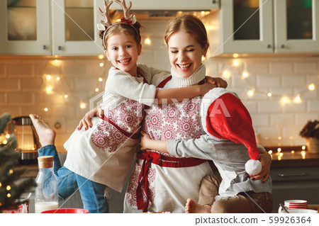 happy family mother and children bake christmas 59926364
