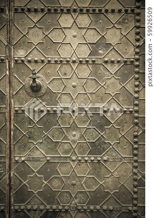 Old metal doors in traditional Moroccan style. Old metal doors in traditional Moroccan style. 59926509