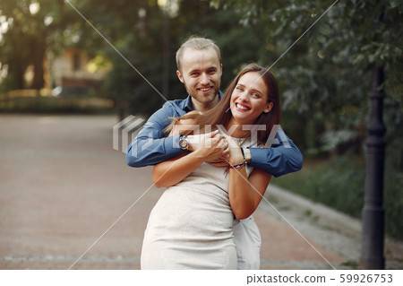 Beautiful couple spend time in a summer park 59926753