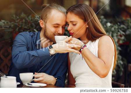 Beautiful couple spend time in a summer city Beautiful couple spend time in a summer city 59926788