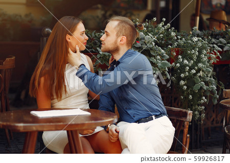 Beautiful couple spend time in a summer city Beautiful couple spend time in a summer city 59926817