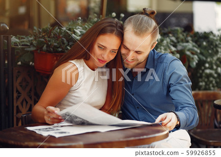 Beautiful couple spend time in a summer city 59926855