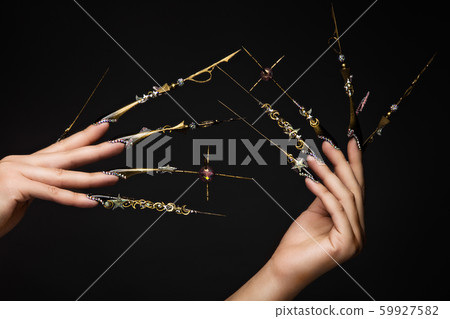 Creative design of nails on female hands. Art manicure. Creative design of nails on female hands. Art manicure. 59927582